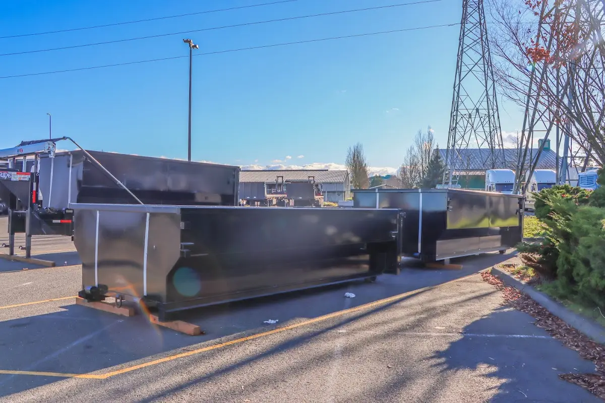 Roll-off dumpster ready for waste disposal at job site for 12 Yard Dumpster Rental in Union Beach